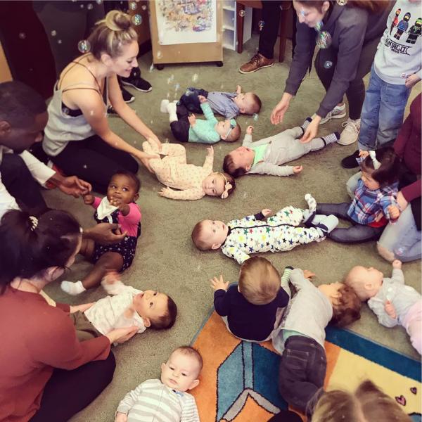 infants and their parents at baby party